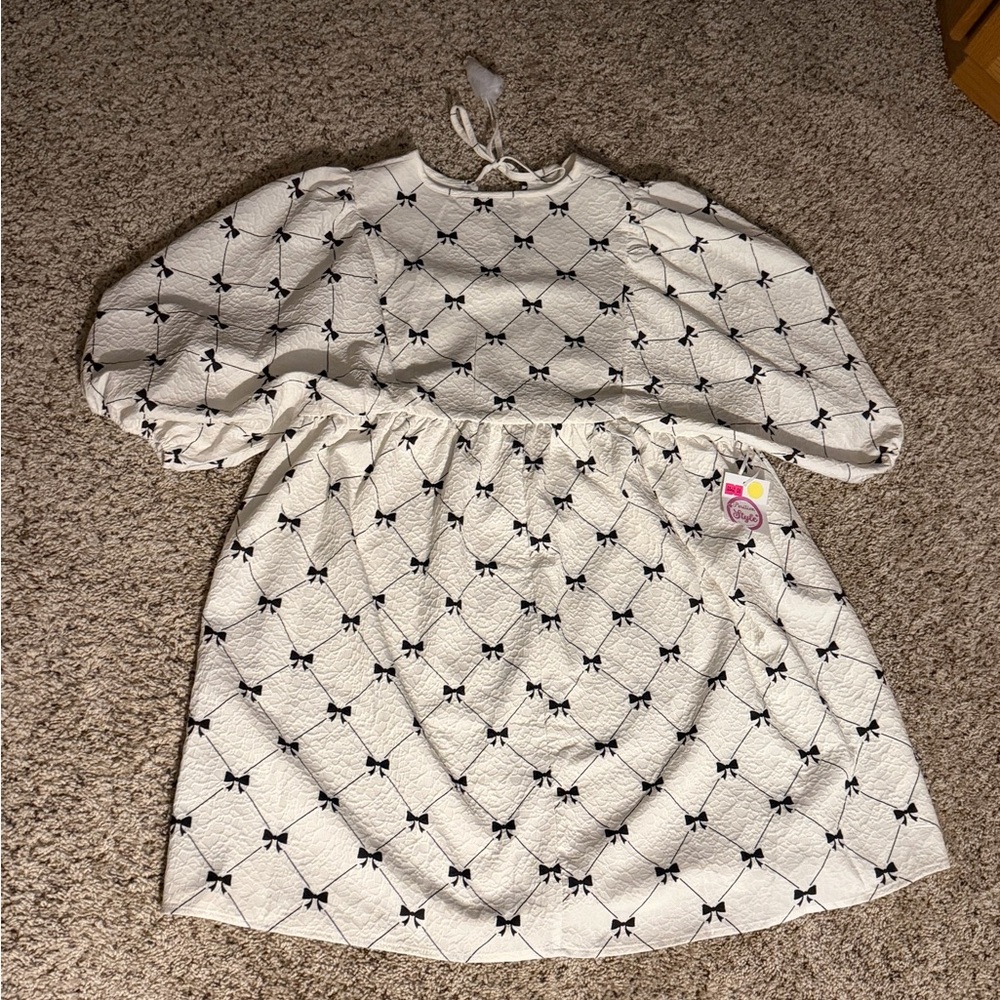 White Dress with Black Bow Pattern